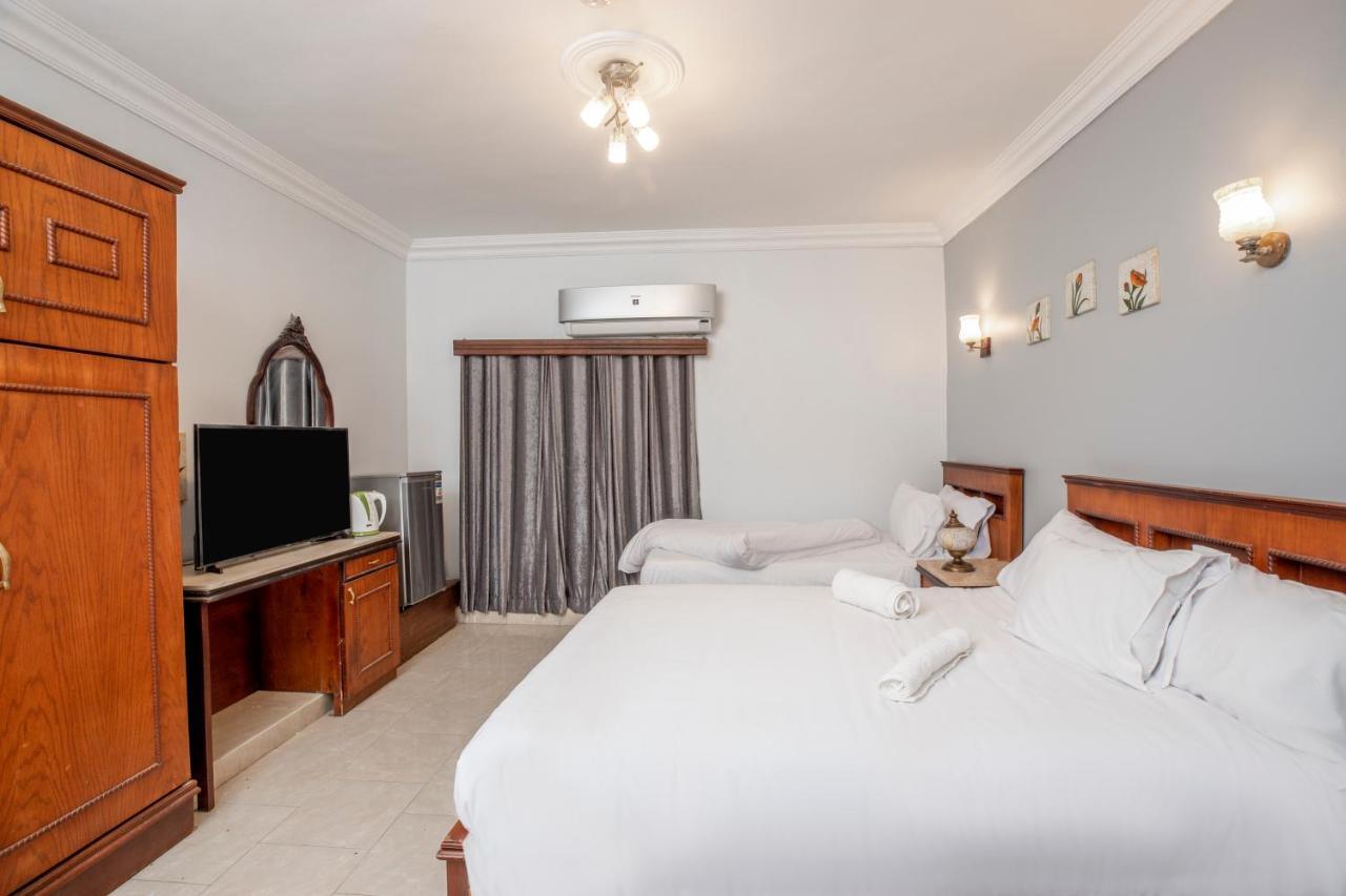 Pyramids Inn Hotel Kafret el-Gabal Екстериор снимка
