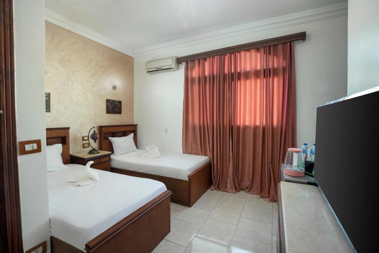 Pyramids Inn Hotel Kafret el-Gabal Екстериор снимка